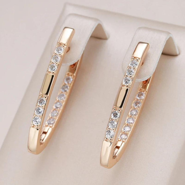 Elegante zirkonia-øreringe i guld