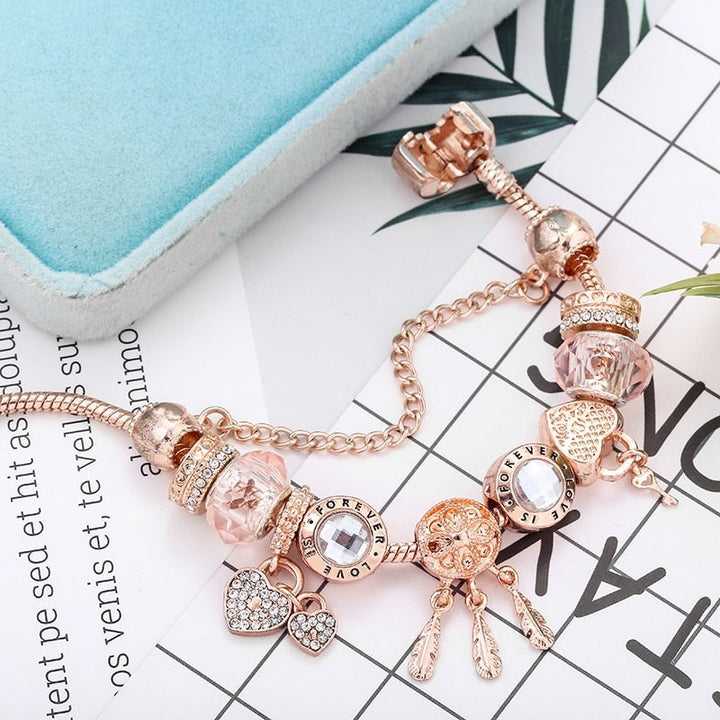 Rose Dreamcatcher-armbånd med charms inkluderet i sterling sølv