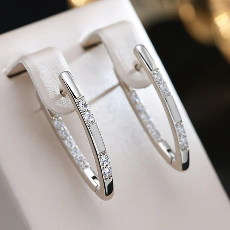 Elegante zirkonia-øreringe i guld